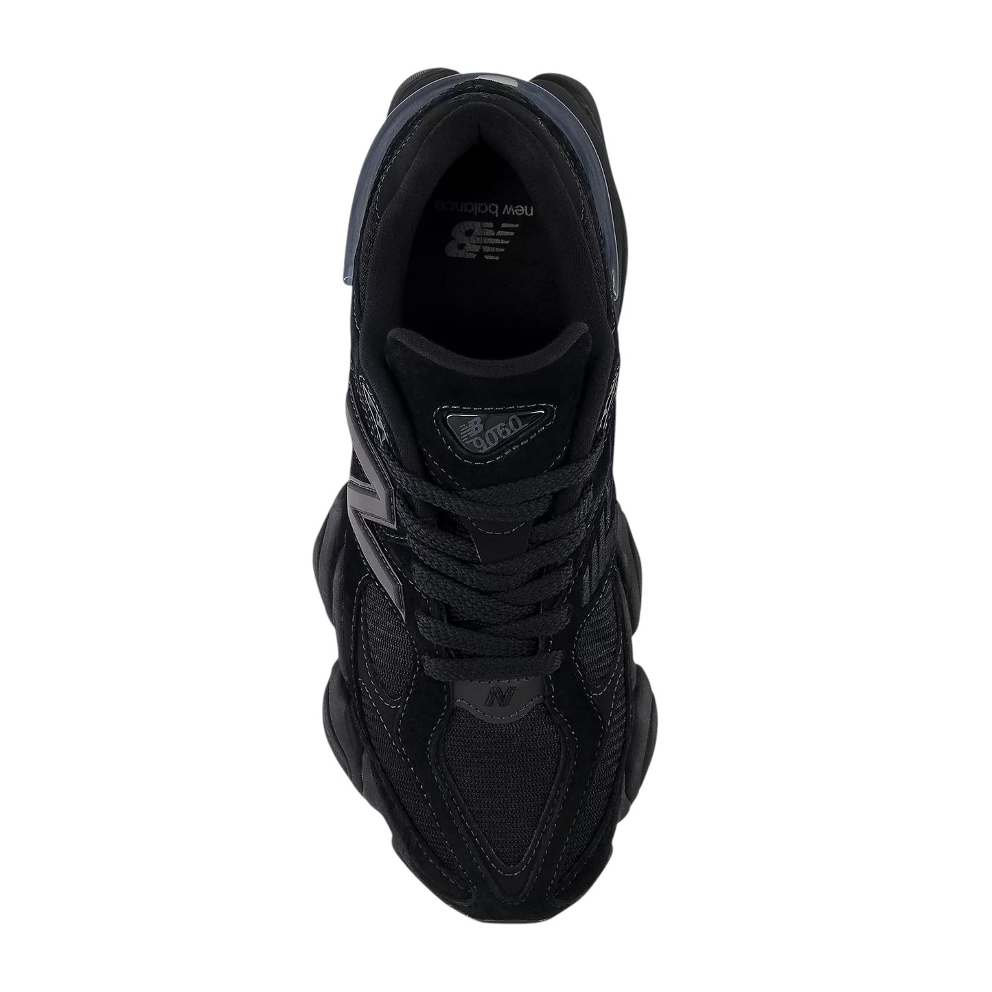 Sneaker Bistro Boutique New Balance 9060 Triple Black men's sneaker in a top-down view showing mesh and suede details.