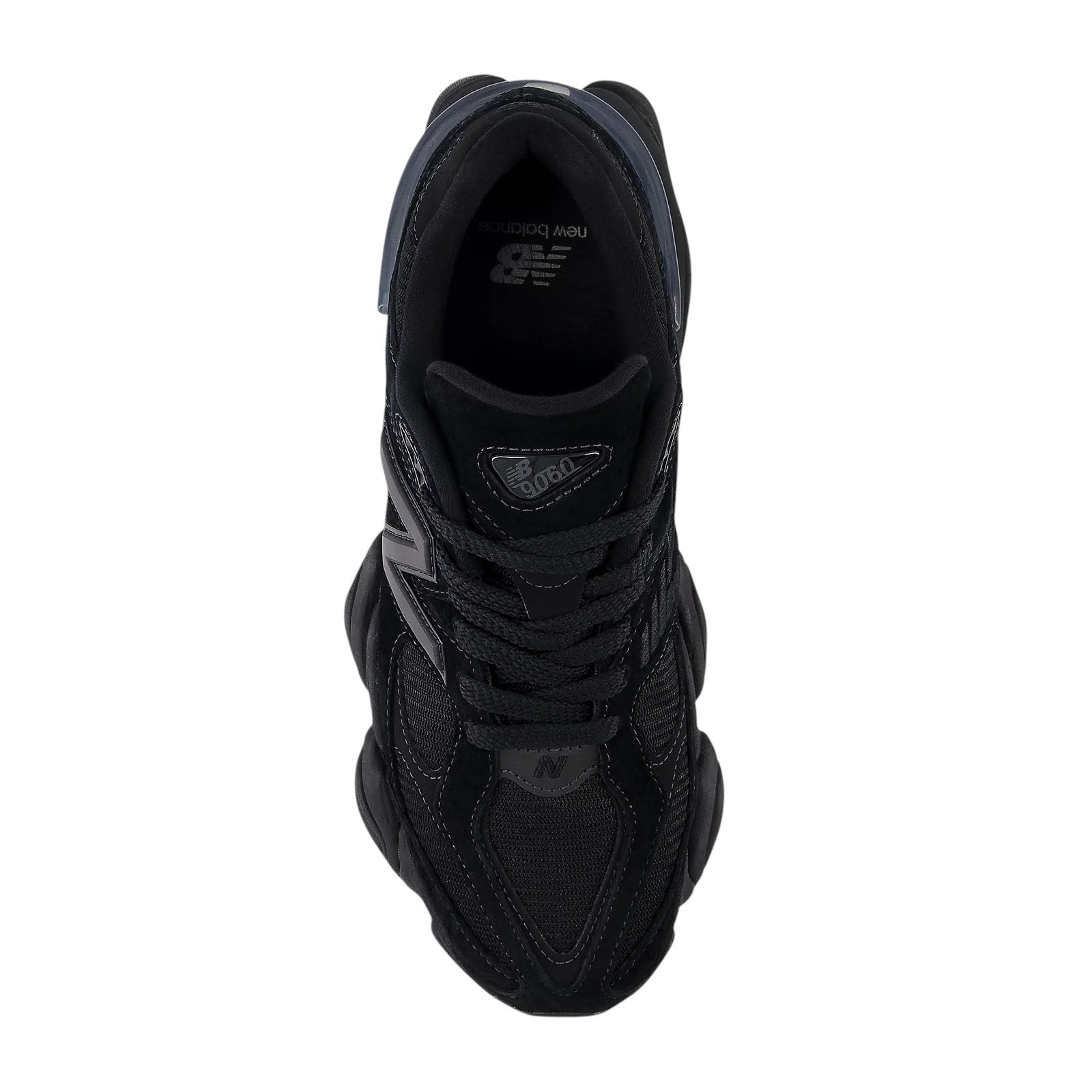 Sneaker Bistro Boutique New Balance 9060 Triple Black men's sneaker in a top-down view showing mesh and suede details.